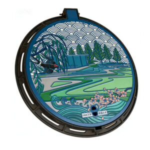 Decorative cast iron manhole cover with custom logo design