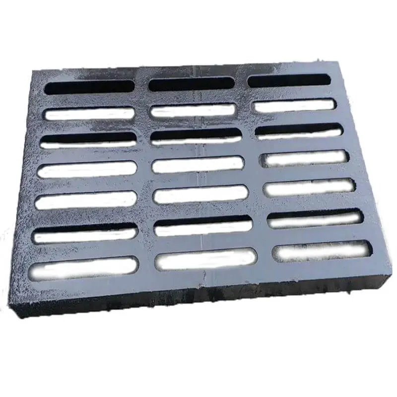 Rectangular drainage grate with anti-slip slot pattern
